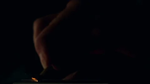 Lighting a match in slow motion . Stock Footage 60409304