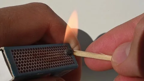 Lighting a match in slow motion - macro close up Stock Footage 333272418