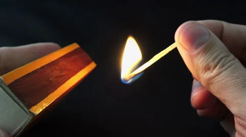 Lighting a match stick 4K Stock Footage 47257126