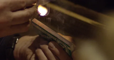 Lighting a match stick slow motion Video stock 56917478