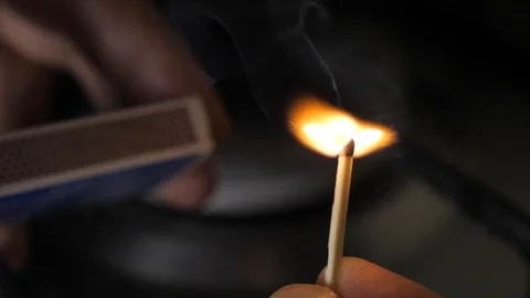 Lighting up match in super slow motion Stock Footage 117587128