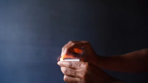 Lighting A Matchstick Stock Footage 121504119