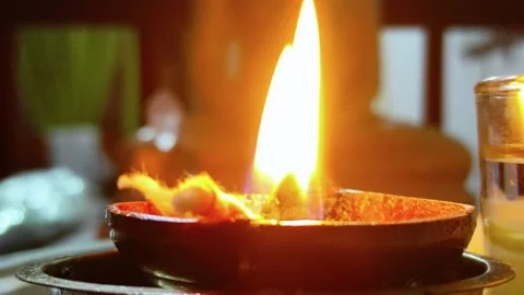 Lighting Oil Lamp During Buddhist Worship Stock Footage 346426010
