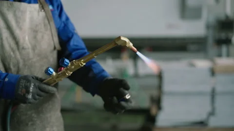 Lighting plasma cutter in the workshop. Stock Footage 170421214