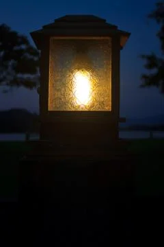 Lighting pole and sunset at camping ground Stock Photos