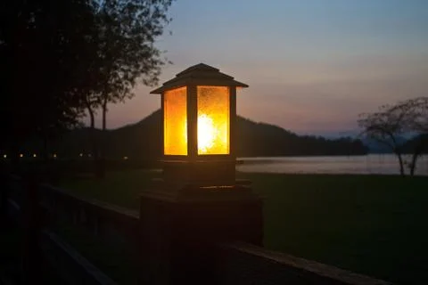 Lighting pole and sunset at camping ground Stock Photos