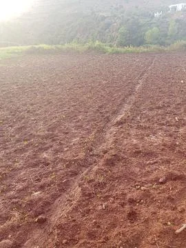 Lighting reflections on a plowed acre Stock Photos