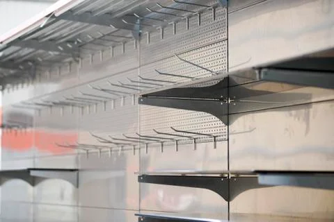 Lighting for retail shelving, empty store shelves Stock Photos
