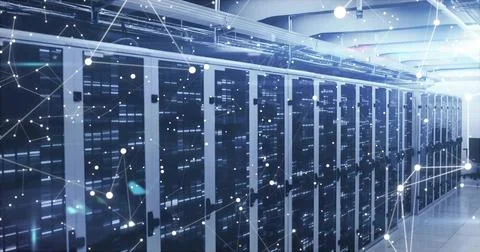 Lighting up server racks lining data center aisle, with network switches and Stock Photos