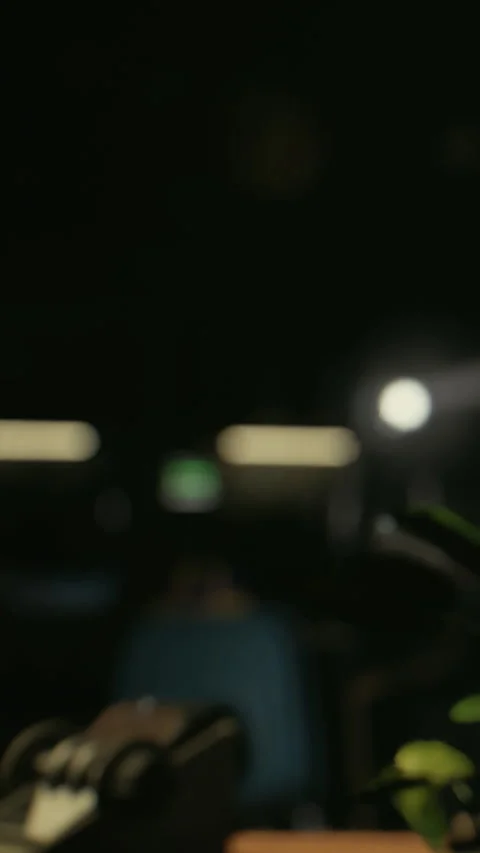Lighting shines on objects at night in a room with dark background Stock Footage 340260931