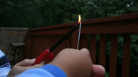 Lighting a sparkler Stock Footage 633301