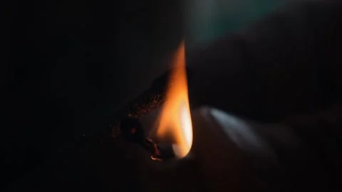 Lighting a sparkler with a match macro in slow motion Stock Footage 137404659