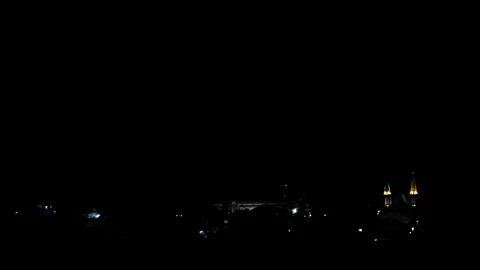 Lighting storm over beach town and sea Stock Footage 81144460
