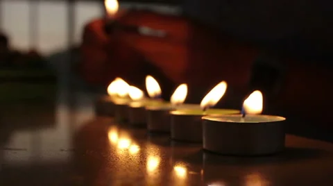 Lighting up tea candles Stock Footage 1237455