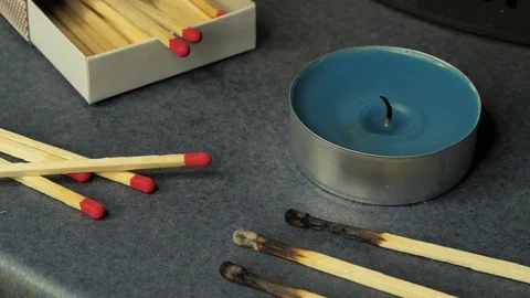 Lighting a tealight Stock Footage 98790526