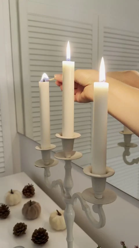 Lighting Three White Candles in Candelabra 4K 60fps 库存影片 344822138