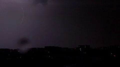 Lighting, Thunderbolt over Buildings in City, Town, Storm in Night, Downtown  Stock Footage