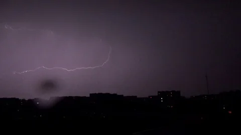 Lighting, Thunderbolt over Buildings in City, Town, Storm in Night, Downtown Stock Footage