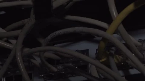 Lighting up wired cables of a data server. Concept of cyberwar, hacking. Stock Footage 142414017