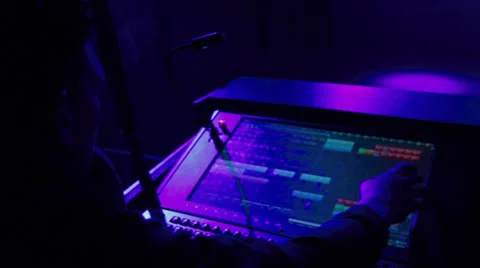Lightjockey behind a light table Stock Footage 24701824