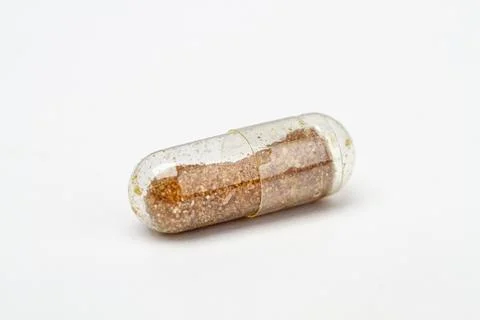 Lightly filled pill Stock Photos