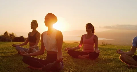The lightness of a sunset meditation Stock Footage 105139575