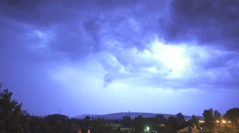 The lightning against the background of the night city. Real time capture Stock Footage 64682968