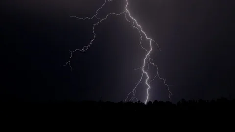 Lightning against the night sky. Thunderstorm with many lightning. Stock Footage