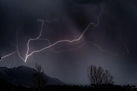 Lightning and thunder in a thunderstorm on a summer night Stock Photos