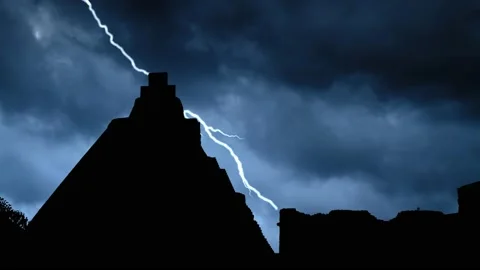 Lightning and Thunderstorm Flash over the Pyramid of the Magician, Uxmal, Mexico Stock Footage 136656900