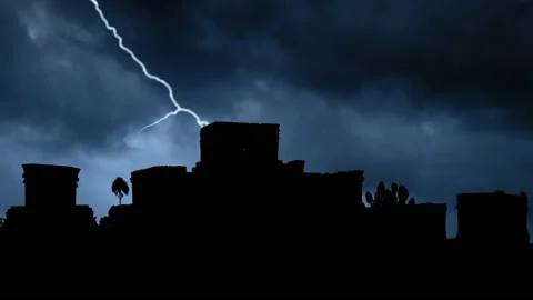 Lightning and Thunderstorm Over Mayan ruins of Tulum in Silhouette, Mexico Stock Footage 155558032