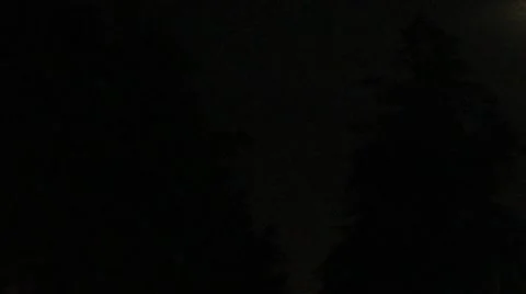 Lightning behind the clouds at night Stock Footage 40053152