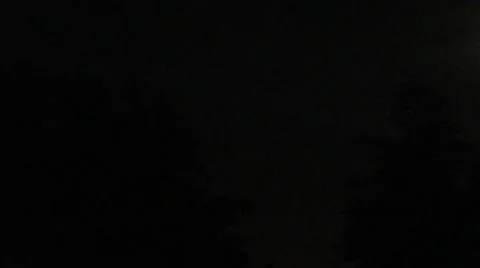 Lightning behind the clouds at night Stock Footage 40053159