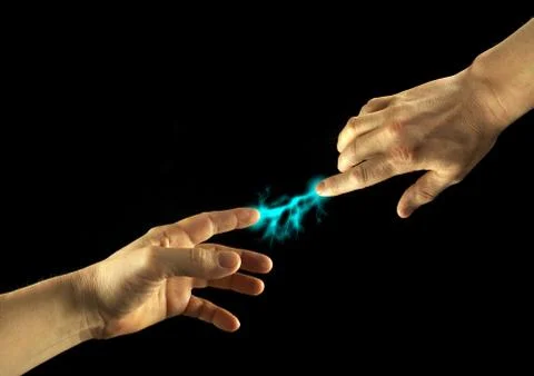 Lightning between fingers Stock Photos