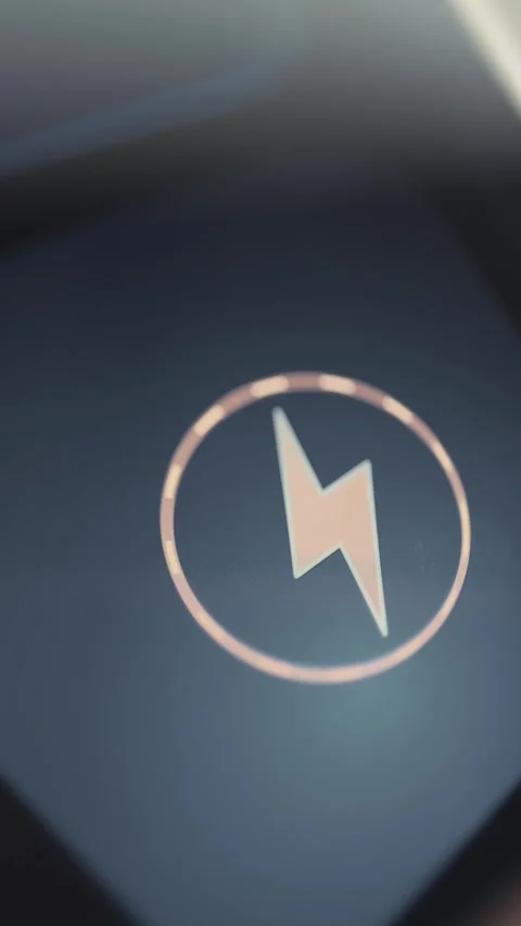 Lightning bolt icon inside a circular power control Stock Footage 342489763
