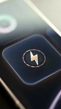 Lightning bolt icon inside a circular power control Stock Photos
