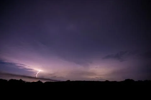 Lightning bolt at night Stock Photos