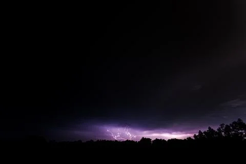 Lightning bolt at night Stock Photos