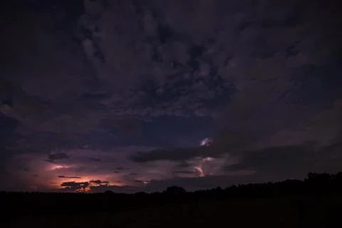 Lightning bolt at night Stock Photos