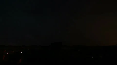 Lightning bolt over city at night Stock Footage 10562598