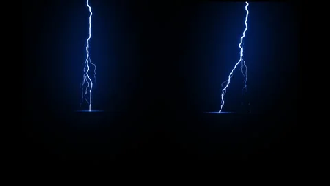 Lightning bolt striking through dark storm clouds in a powerful display Stock Footage 319788776