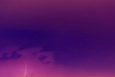 Lightning bolts against the backdrop of a thundercloud. 스톡 사진