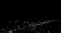 Lightning bolts strike in night sky, thunder clash sounds, rainstorm in the city HD Footage
