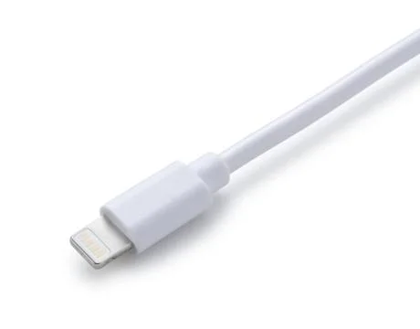 Lightning cable placed on a white background Stock Photos