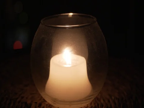 Lightning up a candle in the darkness Stock Footage 80348065