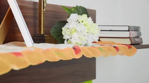 Lightning up the candle in front of the deceased picture. Stock Footage 70198344