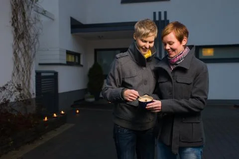 Lightning a candle Stock Photos