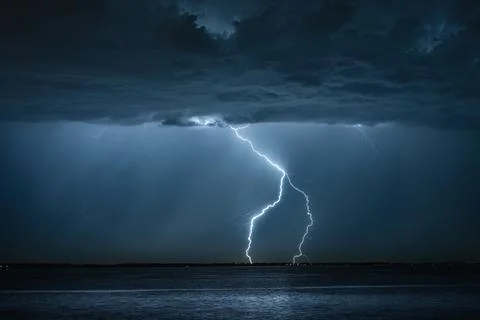 Lightning at the coast Stock Photos
