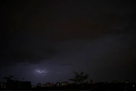 Lightning on a dark sky Stock Photos