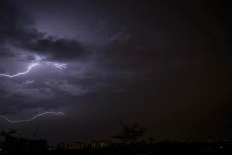 Lightning on a dark sky Stock Photos